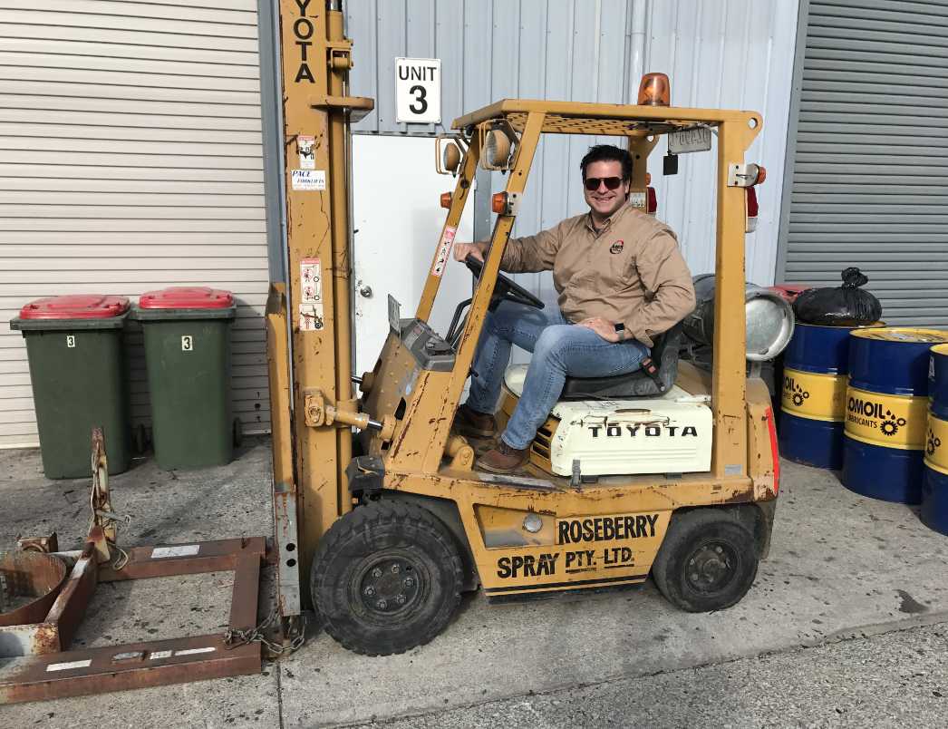 Worker on forklift